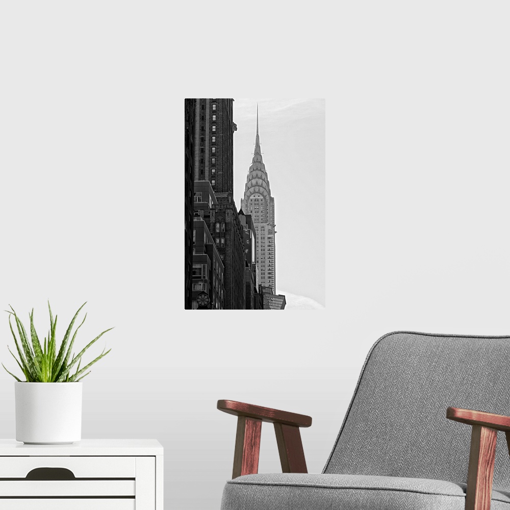 A modern room featuring Black and white photograph of the Chrysler building in New York City