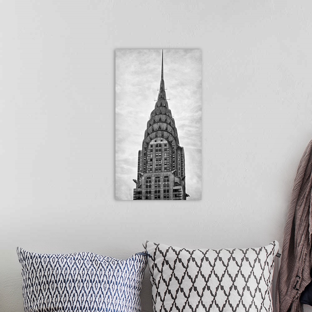 A bohemian room featuring Black and white photograph of the Chrysler building in New York City.