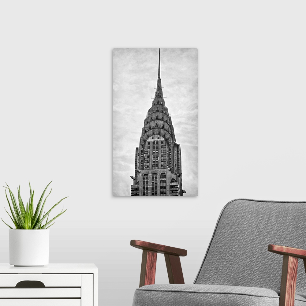 A modern room featuring Black and white photograph of the Chrysler building in New York City.