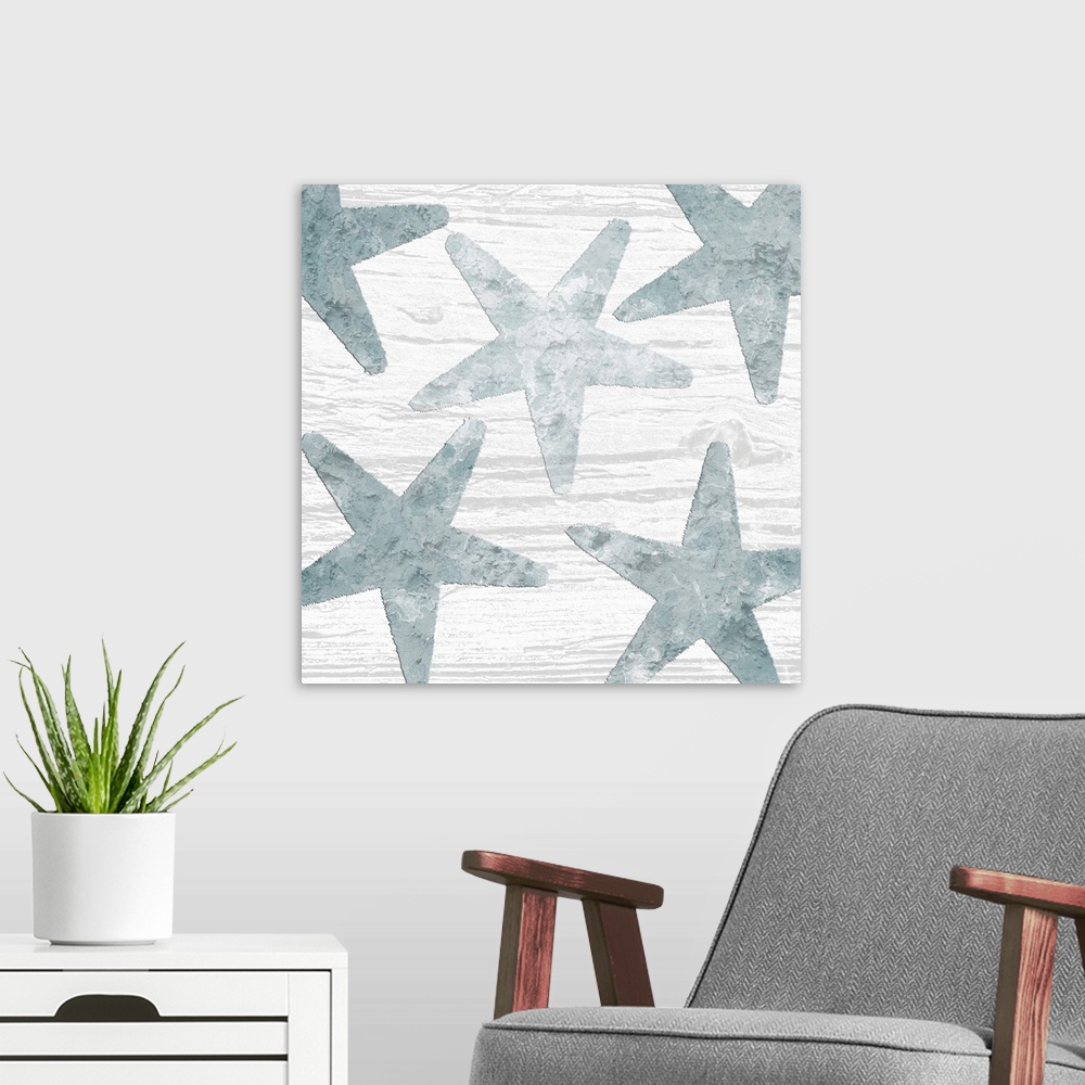 A modern room featuring Square watercolor painting of blue starfish on a white wood grain background.