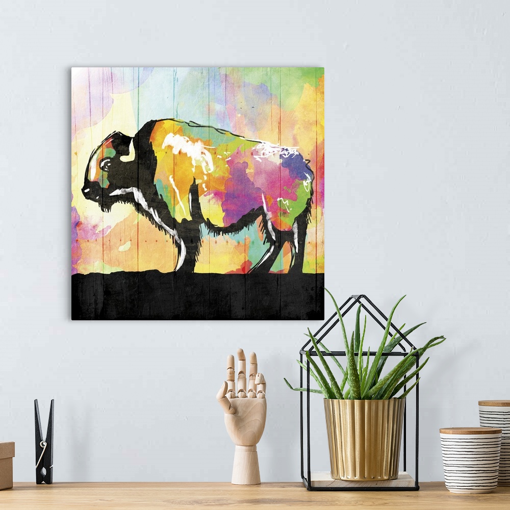 A bohemian room featuring A bright and colorful painting of a buffalo with contrasting black and white hues.