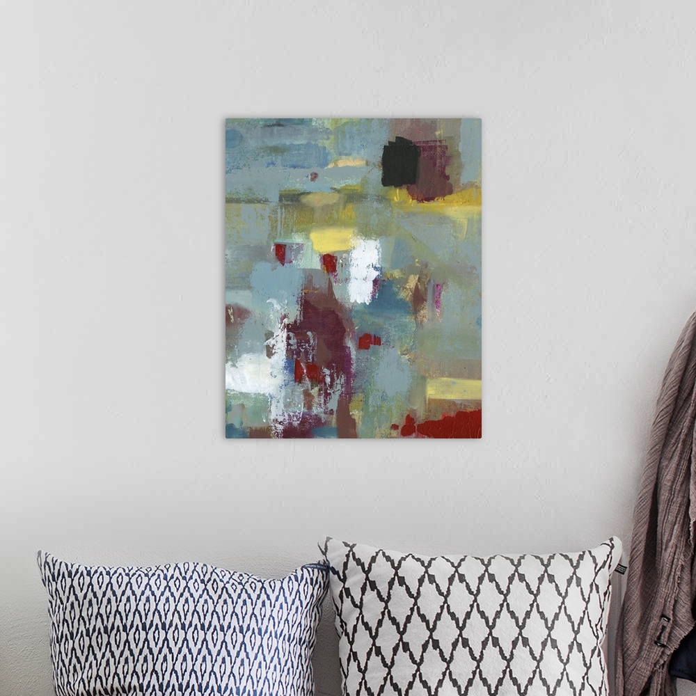 A bohemian room featuring Abstract painting using vibrant colors and harsh strokes.