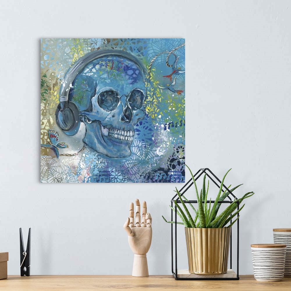 A bohemian room featuring Contemporary painting of a skull wearing headphones.