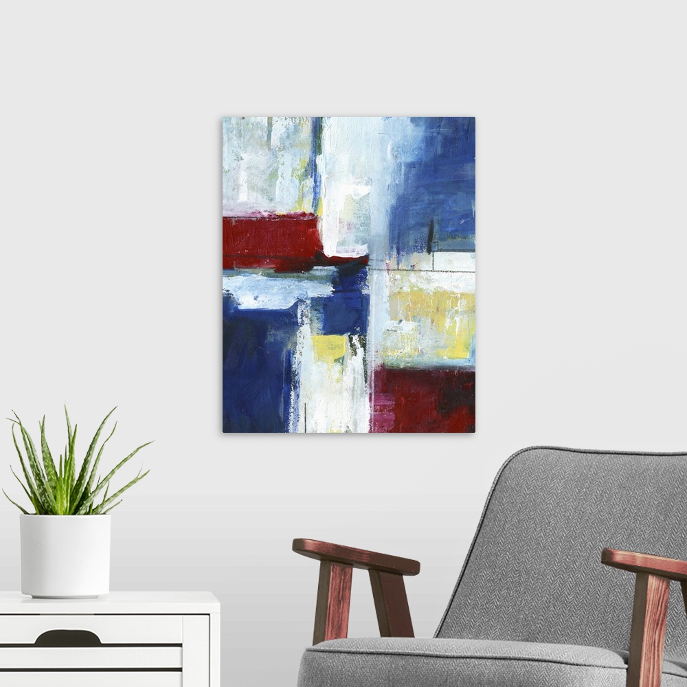 A modern room featuring Abstract painting using vibrant colors and harsh strokes.