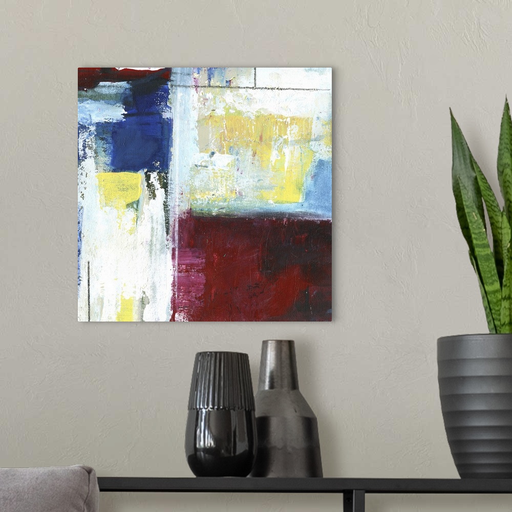 A modern room featuring Abstract painting using vibrant colors and harsh strokes.