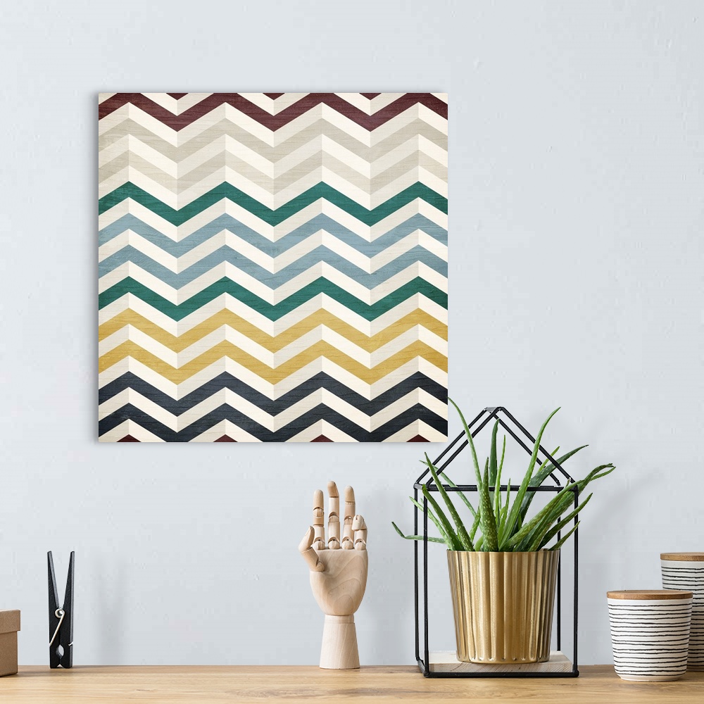 A bohemian room featuring A painting of a colorful zigzag pattern on a wood grain background.