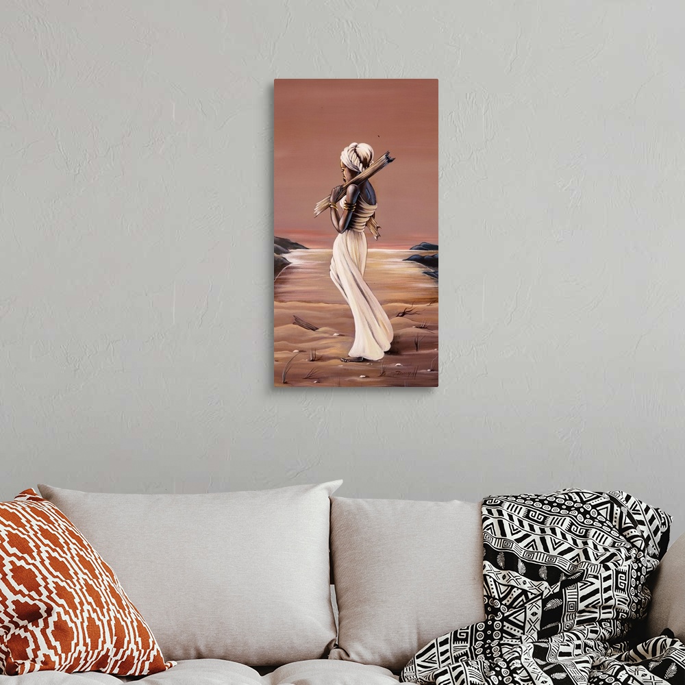 A bohemian room featuring Contemporary African painting of a woman walking along the beach holding a piece of driftwood.