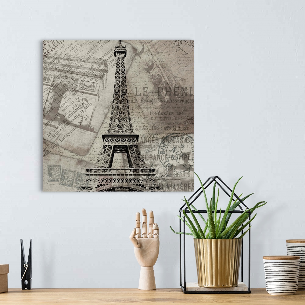 A bohemian room featuring Contemporary artwork of the Eiffel Tower against travel and postage documentation in black and wh...
