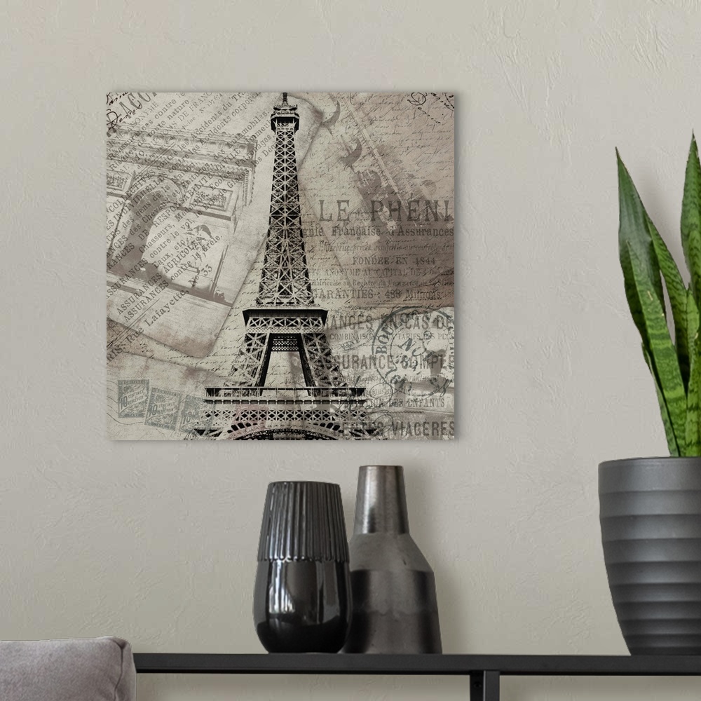 A modern room featuring Contemporary artwork of the Eiffel Tower against travel and postage documentation in black and wh...