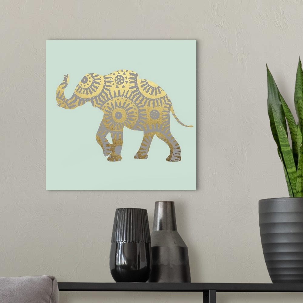 A modern room featuring Square illustration of a metallic gold elephant with silver designs on a light green background.