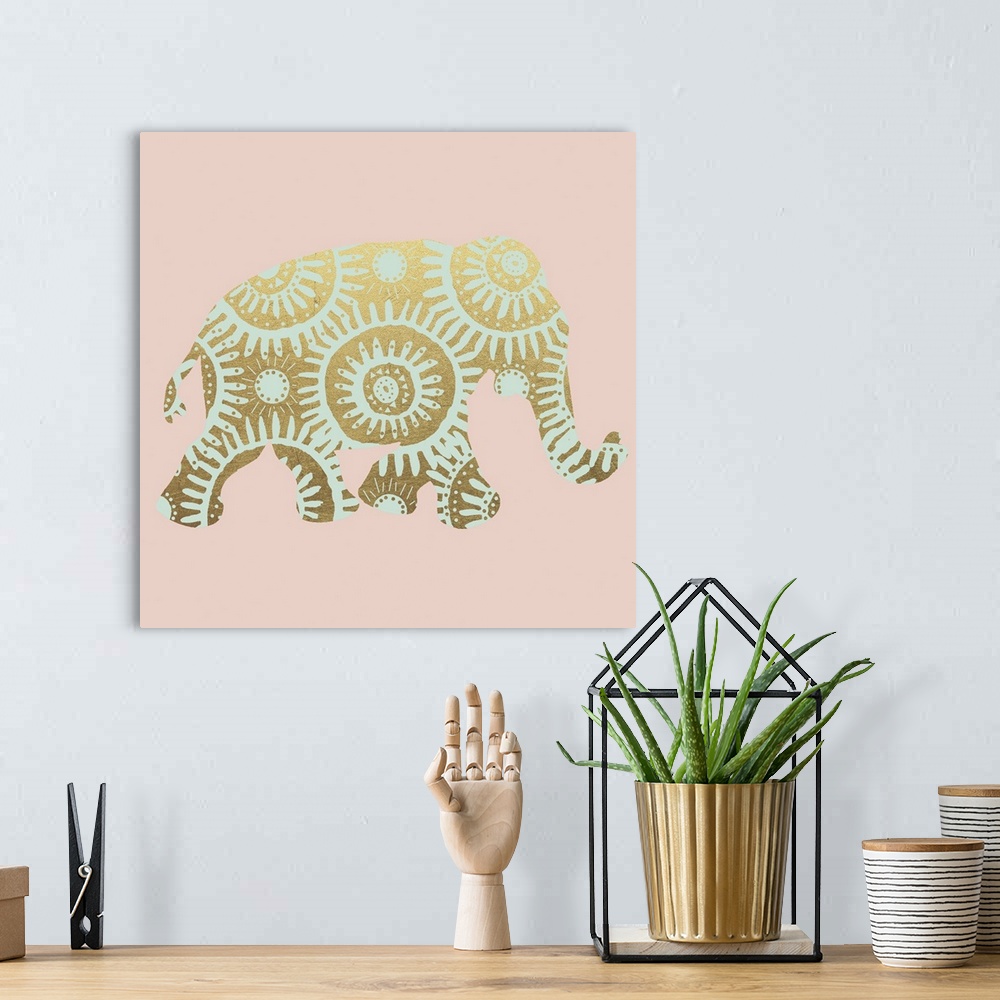 A bohemian room featuring Square illustration of a light green elephant with a metallic gold design on a light pink backgro...