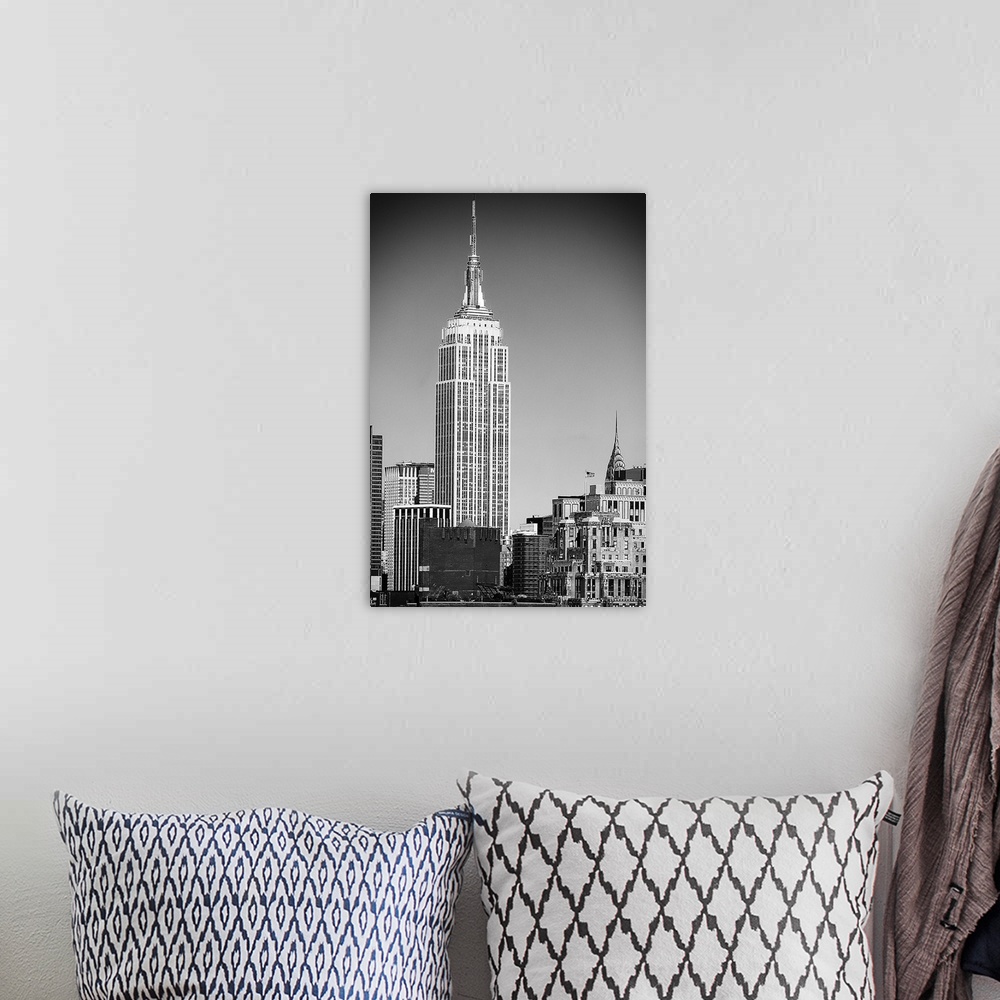 A bohemian room featuring Black and white photograph of New York City. With the Empire State building prominently standing ...