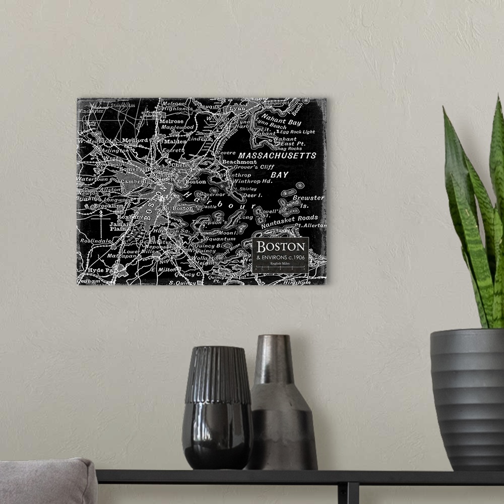 A modern room featuring Rustic contemporary art map of Boston districts, in black and white.