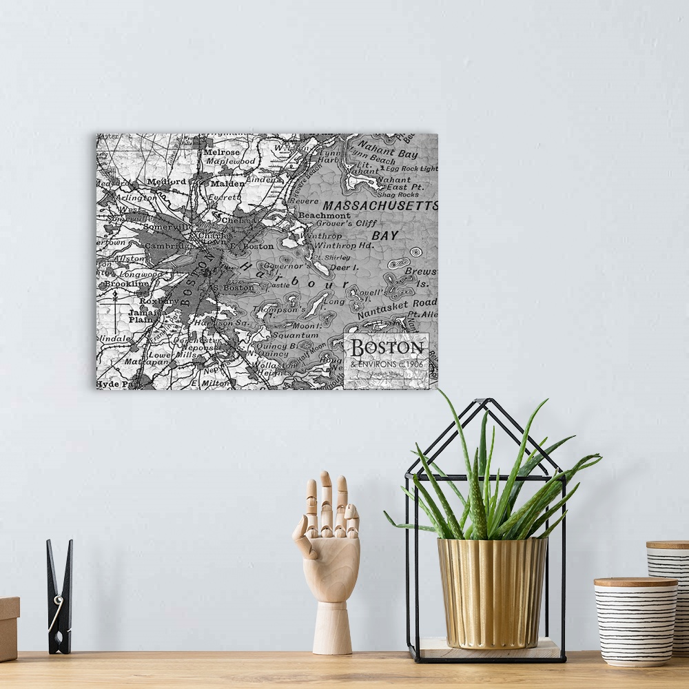 A bohemian room featuring Rustic contemporary art map of Boston districts, in black and white.