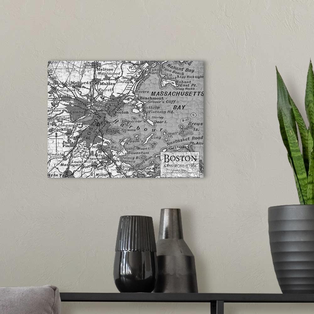 A modern room featuring Rustic contemporary art map of Boston districts, in black and white.