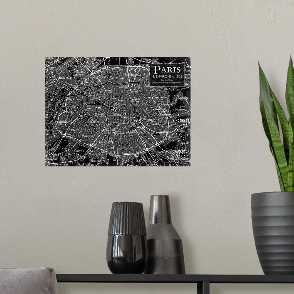 A modern room featuring Rustic contemporary art map of Paris districts, in black and white.