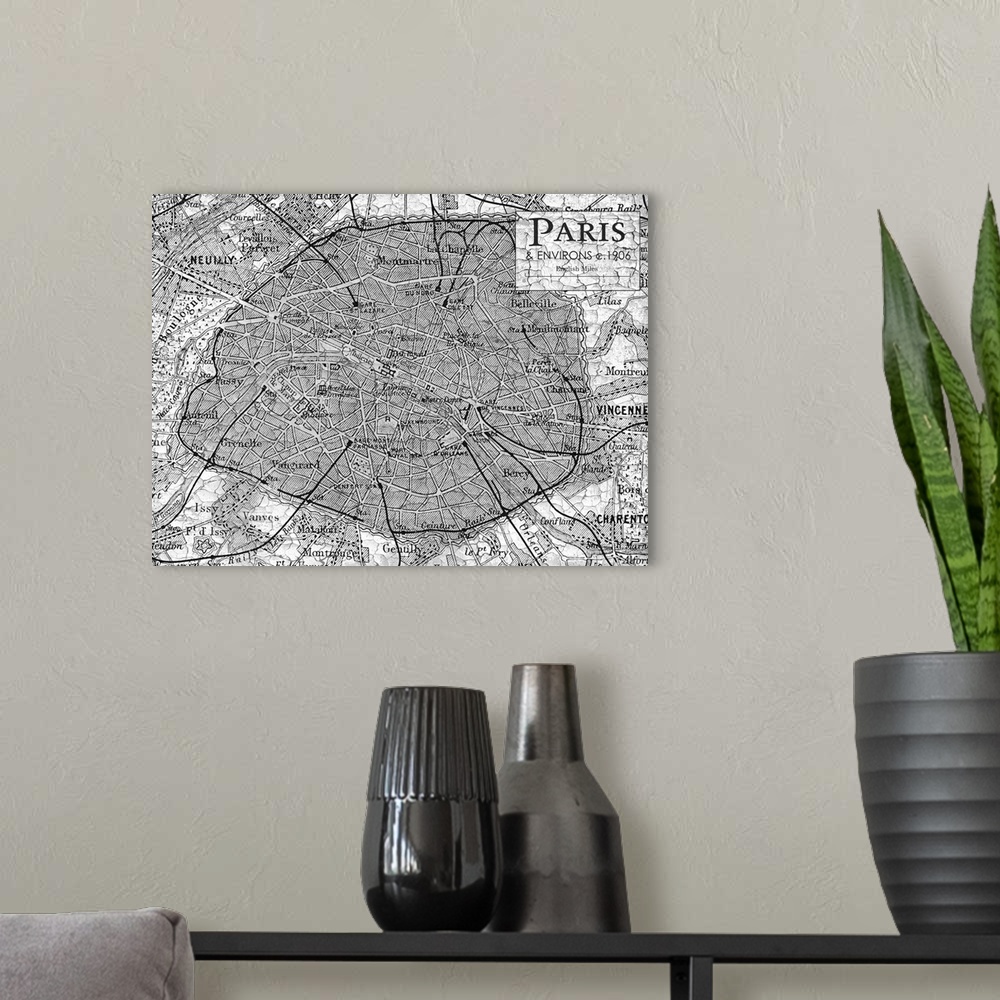 A modern room featuring Rustic contemporary art map of Paris districts, in black and white.