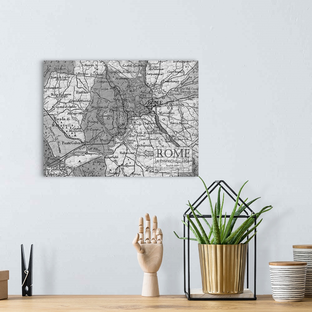 A bohemian room featuring Rustic contemporary art map of Rome districts, in black and white.