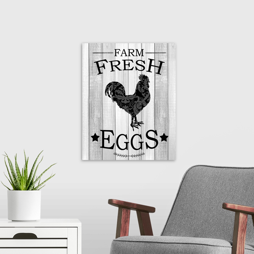 A modern room featuring "Farm Fresh Eggs" with a silhouette of a chicken in a paisley pattern on gray wooded boards.