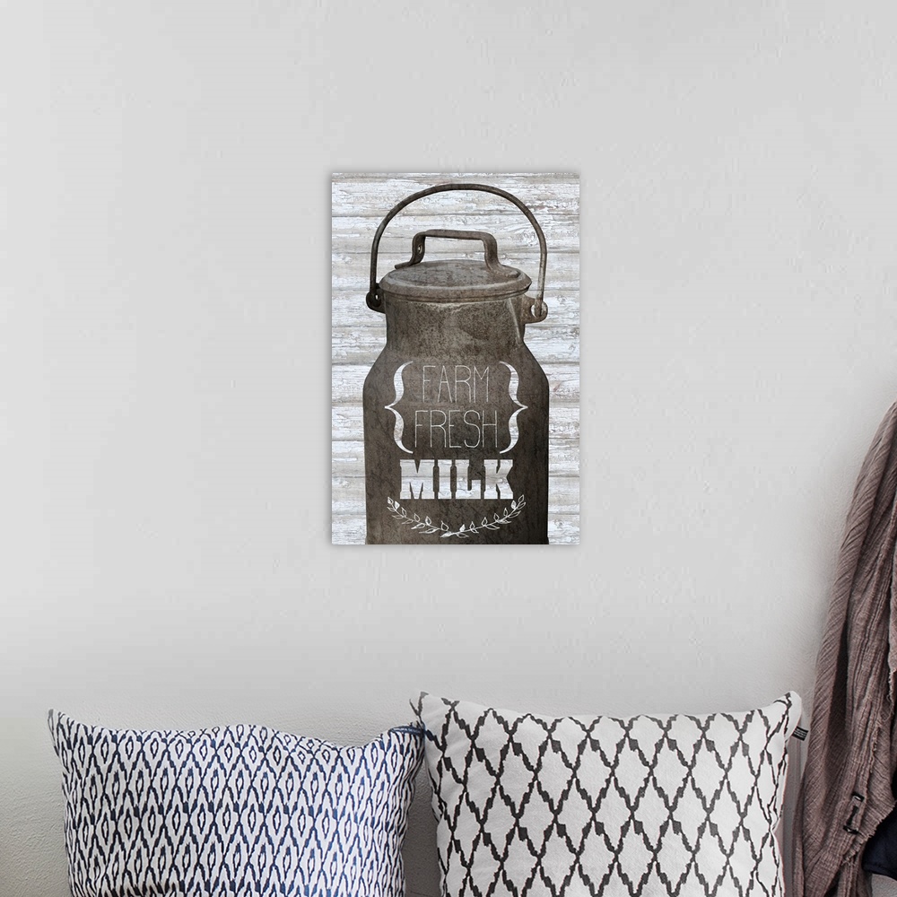 A bohemian room featuring "Farm Fresh Milk" text on a milk bucket over a wood plank background.