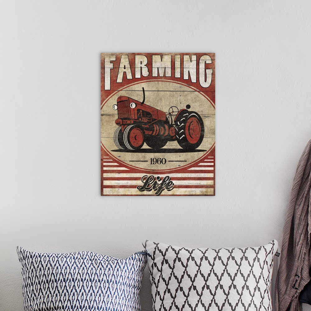 A bohemian room featuring Vintage weathered, rustic looking sign, with a red tractor and the text "Farming" above it.