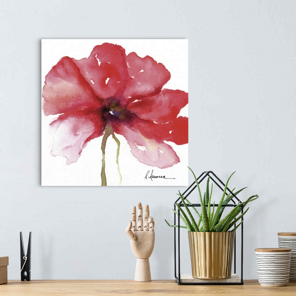 A bohemian room featuring Watercolor painting of a large red flower.