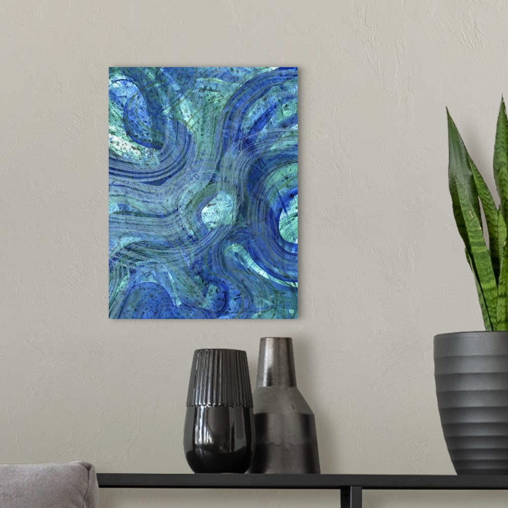 A modern room featuring Contemporary abstract artwork resembling waves in deep blue water.