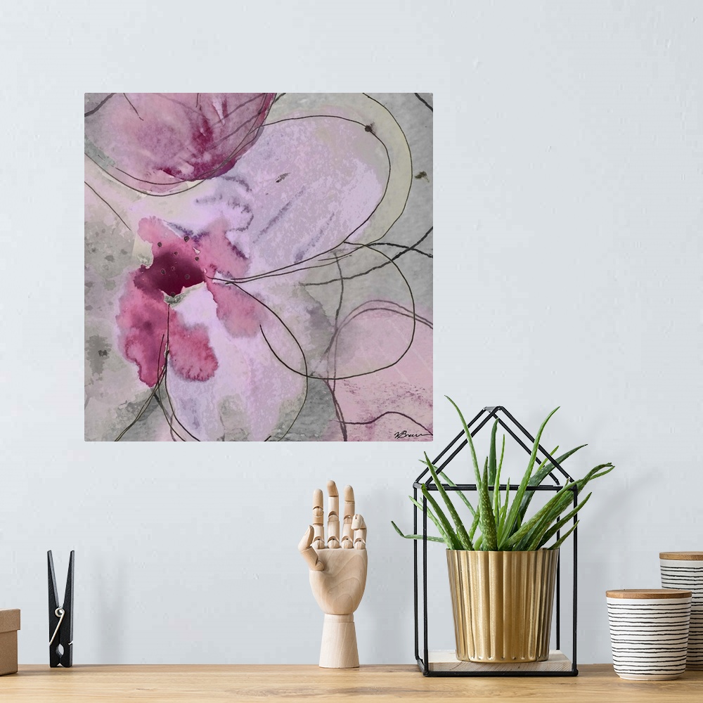 A bohemian room featuring Contemporary home decor artwork of pink abstract flowers.