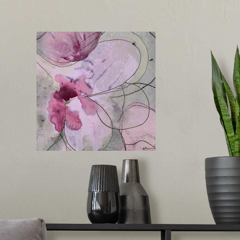 A modern room featuring Contemporary home decor artwork of pink abstract flowers.
