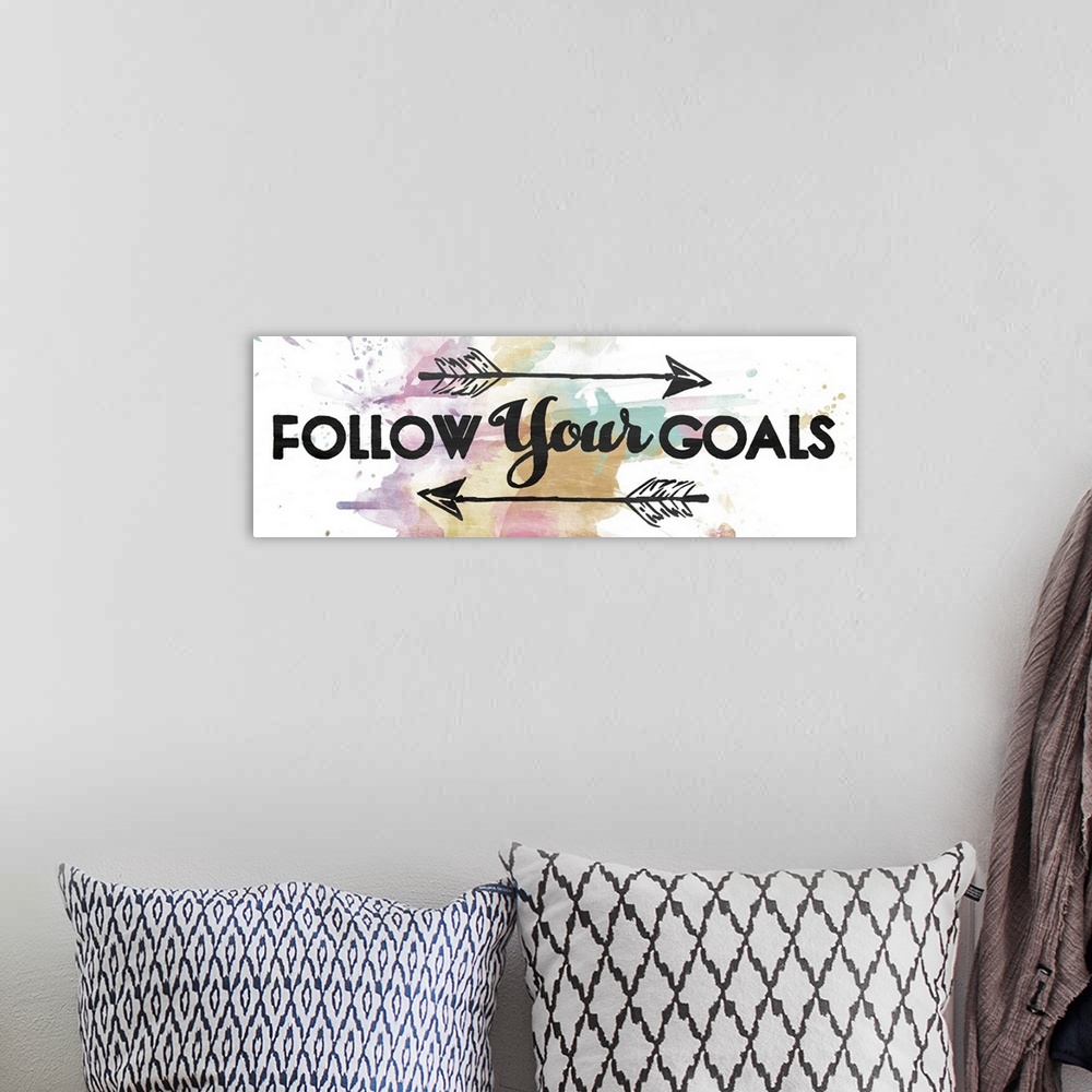 A bohemian room featuring Follow Your Goals