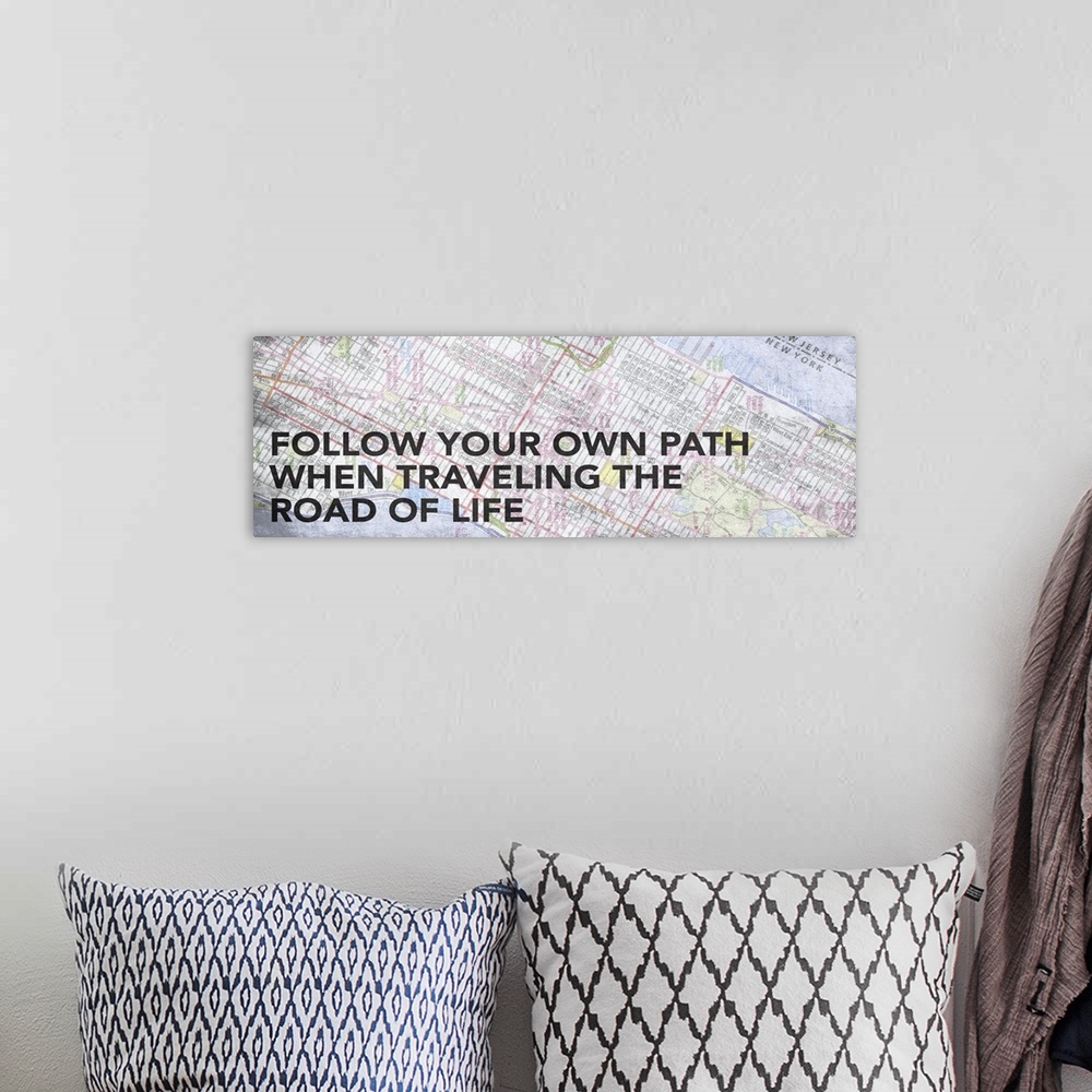 A bohemian room featuring Travel typography against a map background.