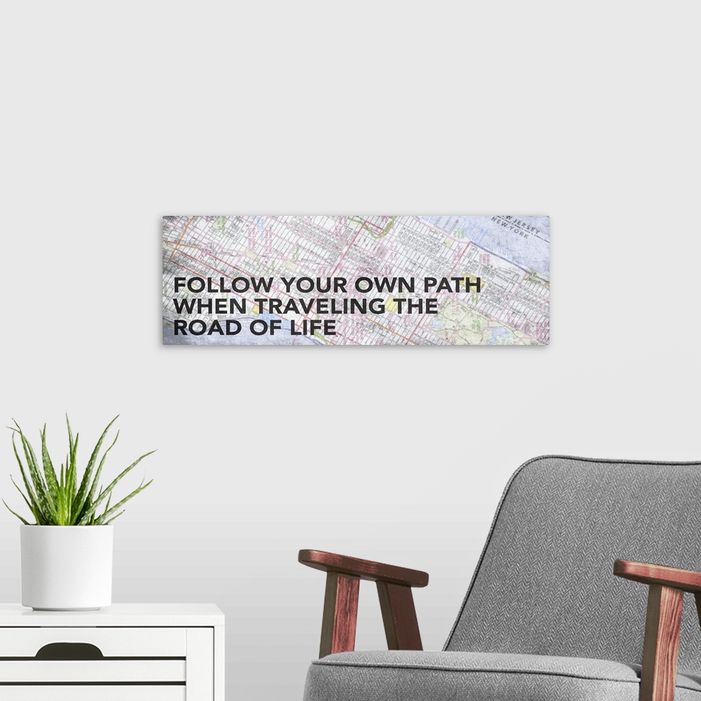 A modern room featuring Travel typography against a map background.