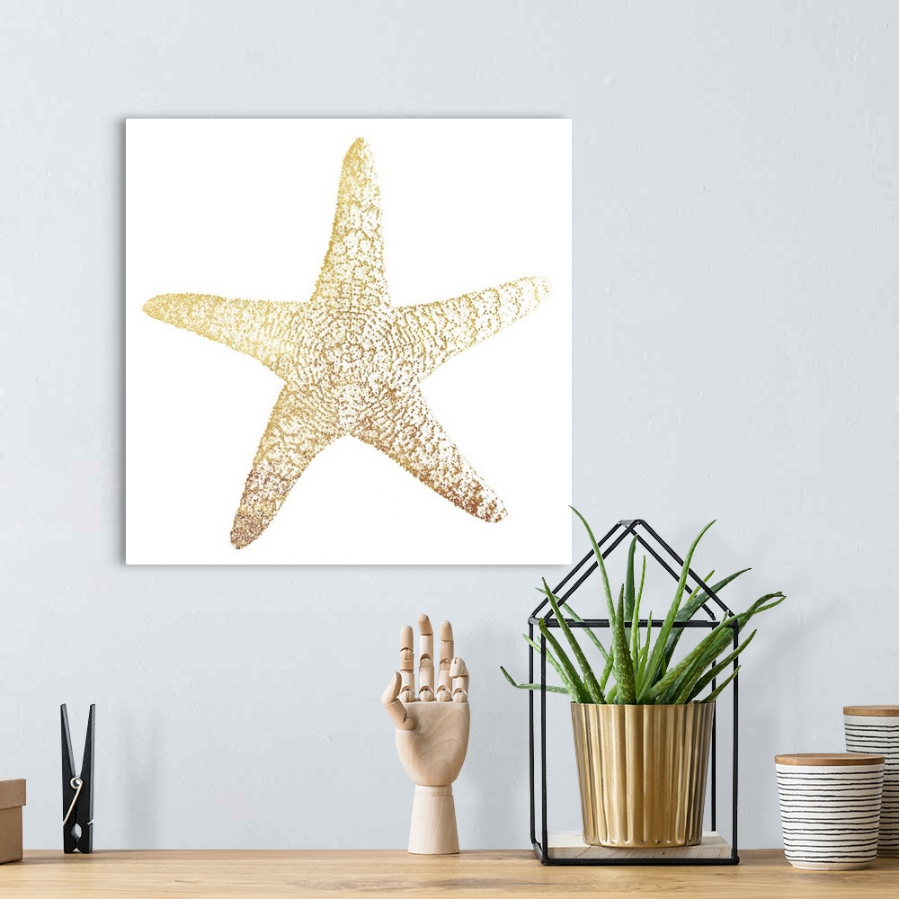 A bohemian room featuring A gold foil starfish design on a white background.