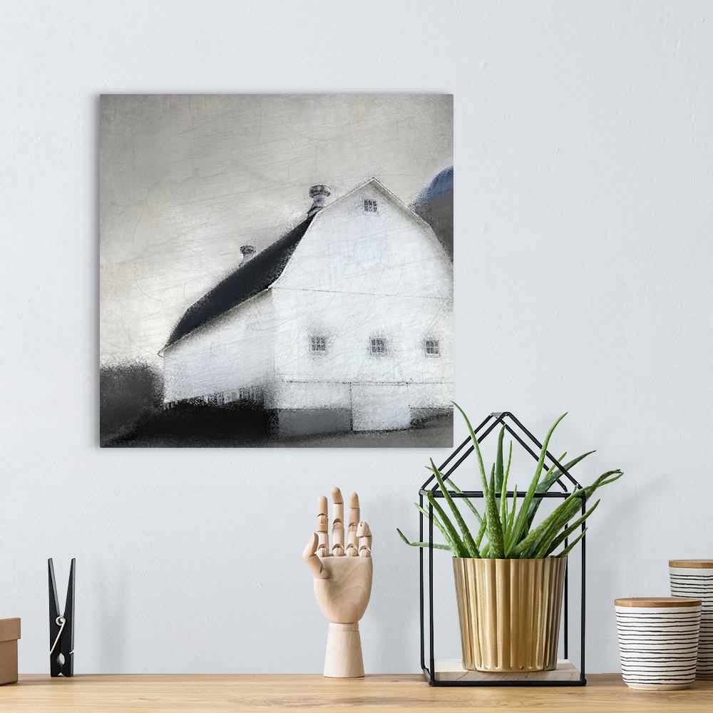 A bohemian room featuring An image in shades of gray of a barn with trees behind it and a gray sky with a textured overlay.