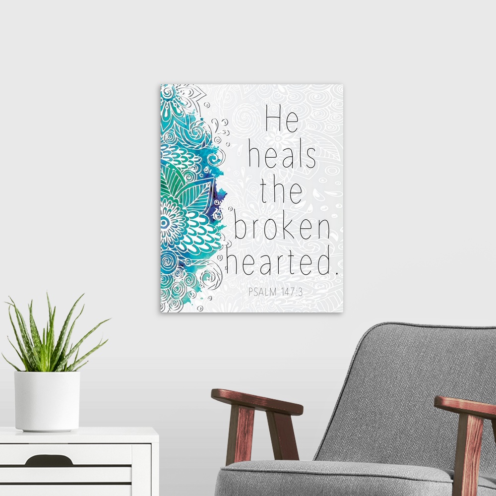 A modern room featuring Bible verse Psalm 147:3 with a blue floral design.