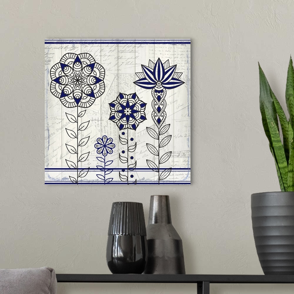 A modern room featuring A black and blue symmetric design of four flowers with a collage of handwritten postcards in the ...