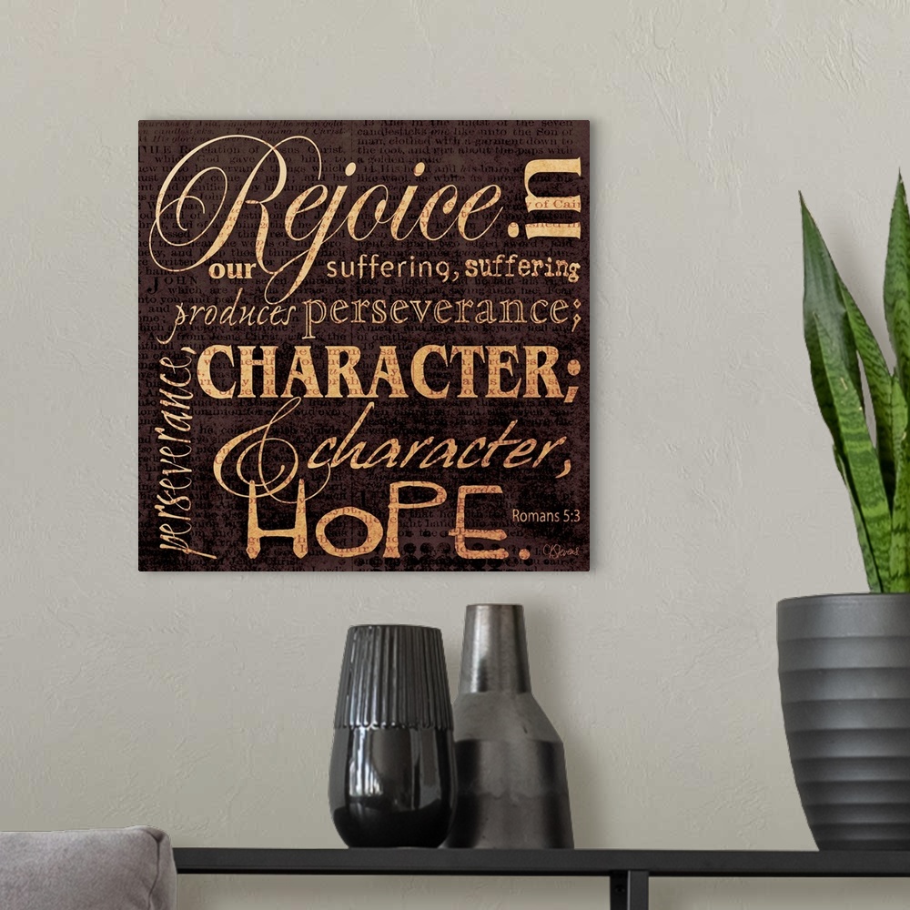 A modern room featuring Typographical scripture art done in warm, earthy tones. With text in multiple directions.