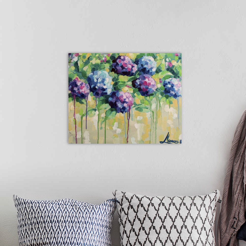 A bohemian room featuring Contemporary paining of colorful hydrangea flowers against a pale yellow background.