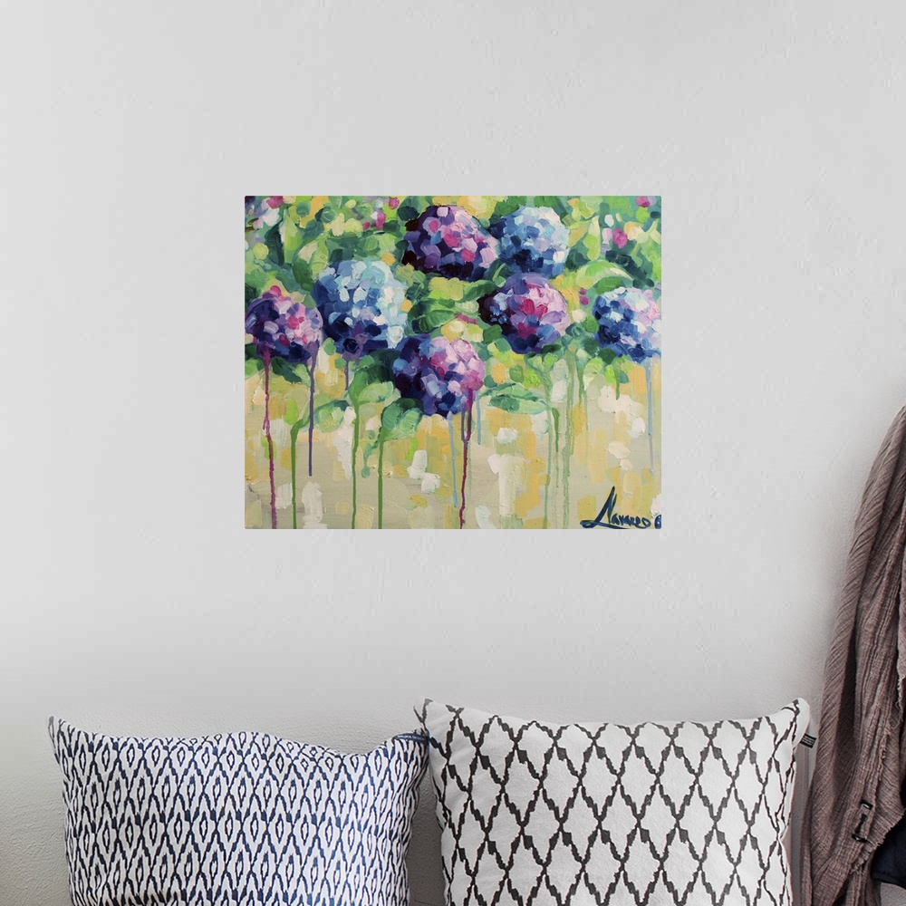 A bohemian room featuring Contemporary paining of colorful hydrangea flowers against a pale yellow background.