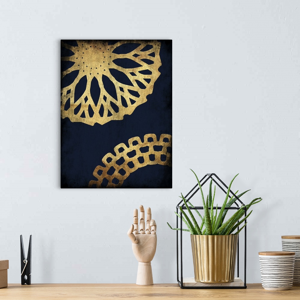 A bohemian room featuring Gold mandala patterns on navy blue.