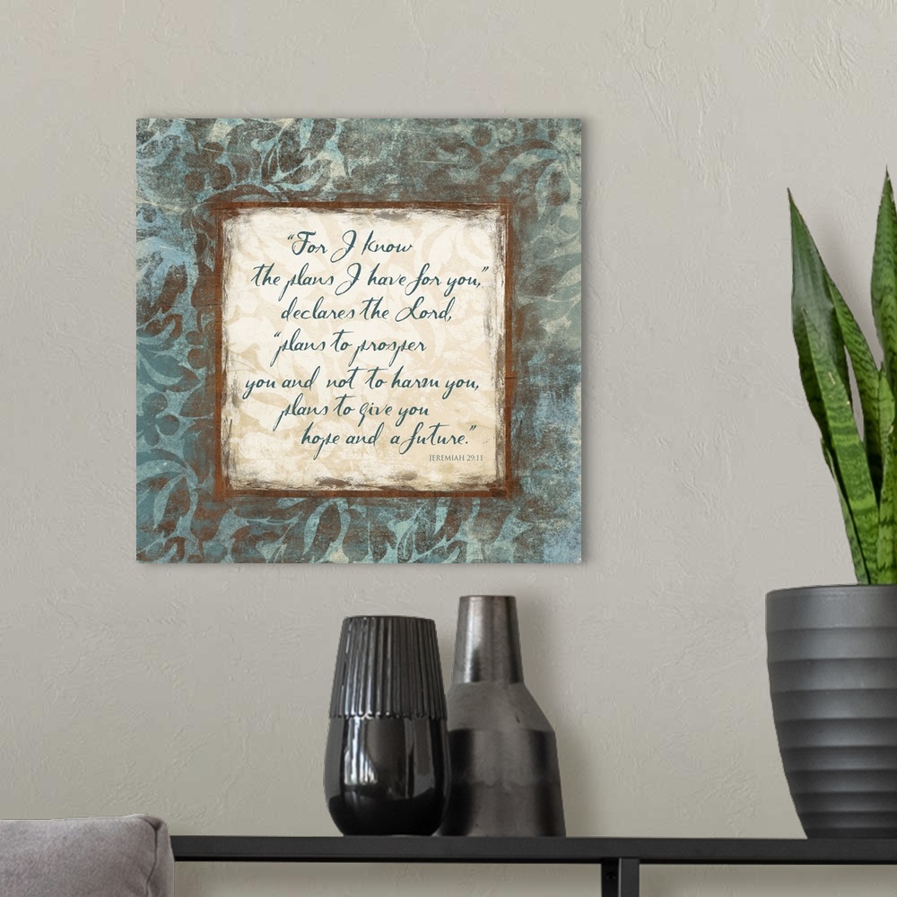 A modern room featuring Scripture artwork with script "Jeremiah 29:11" from the bible, surrounded by a floral pattern.