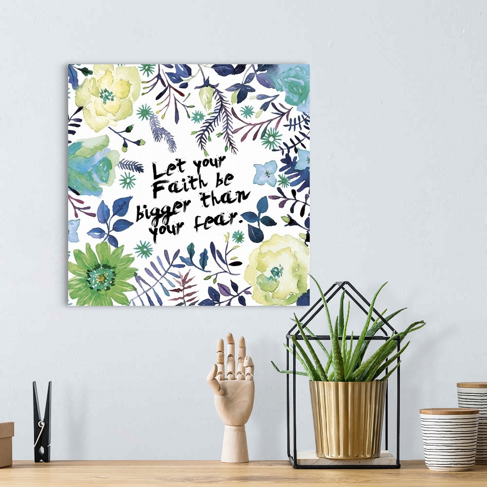 A bohemian room featuring "Let your faith be bigger than your fear" decorated with watercolor flowers, leaves, and vines.