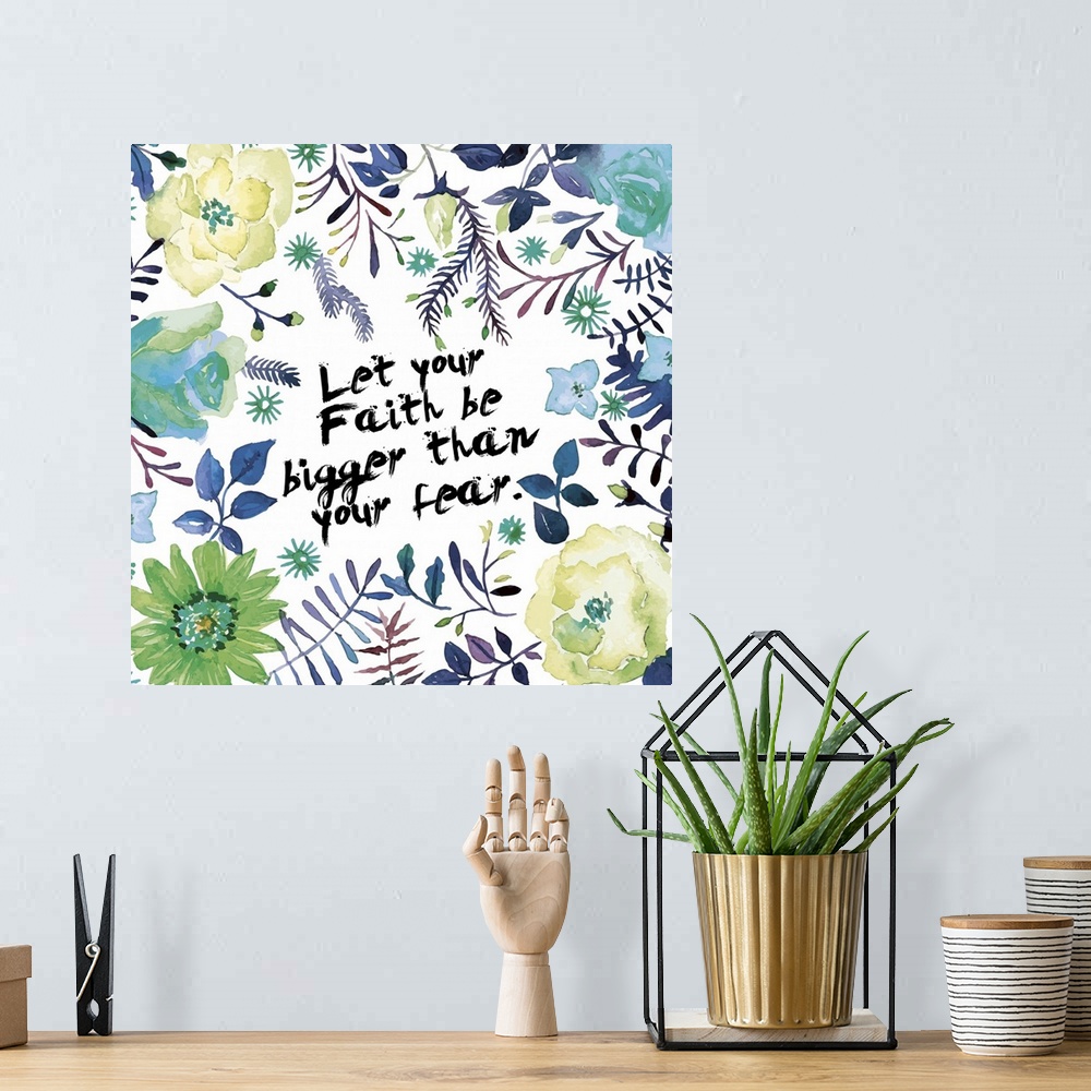 A bohemian room featuring "Let your faith be bigger than your fear" decorated with watercolor flowers, leaves, and vines.