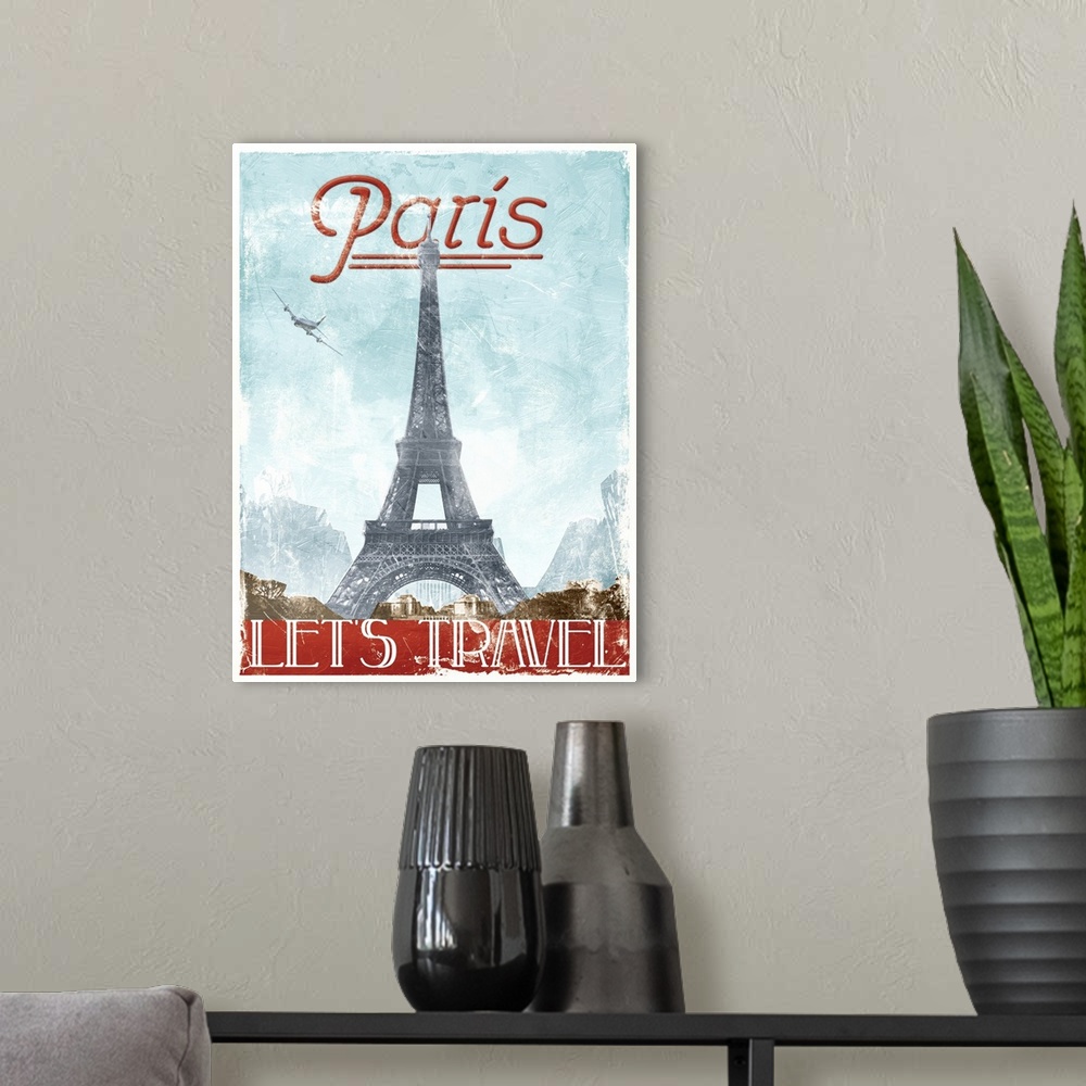 A modern room featuring Home decor artwork of a travel poster for France in a vintage style.