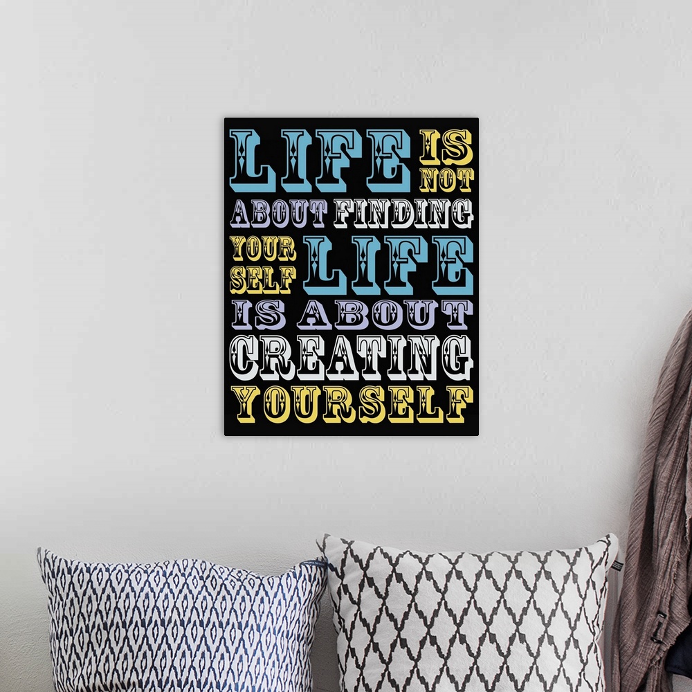 A bohemian room featuring Typography inspirational quote art, with lettering done in a fun carnival style.