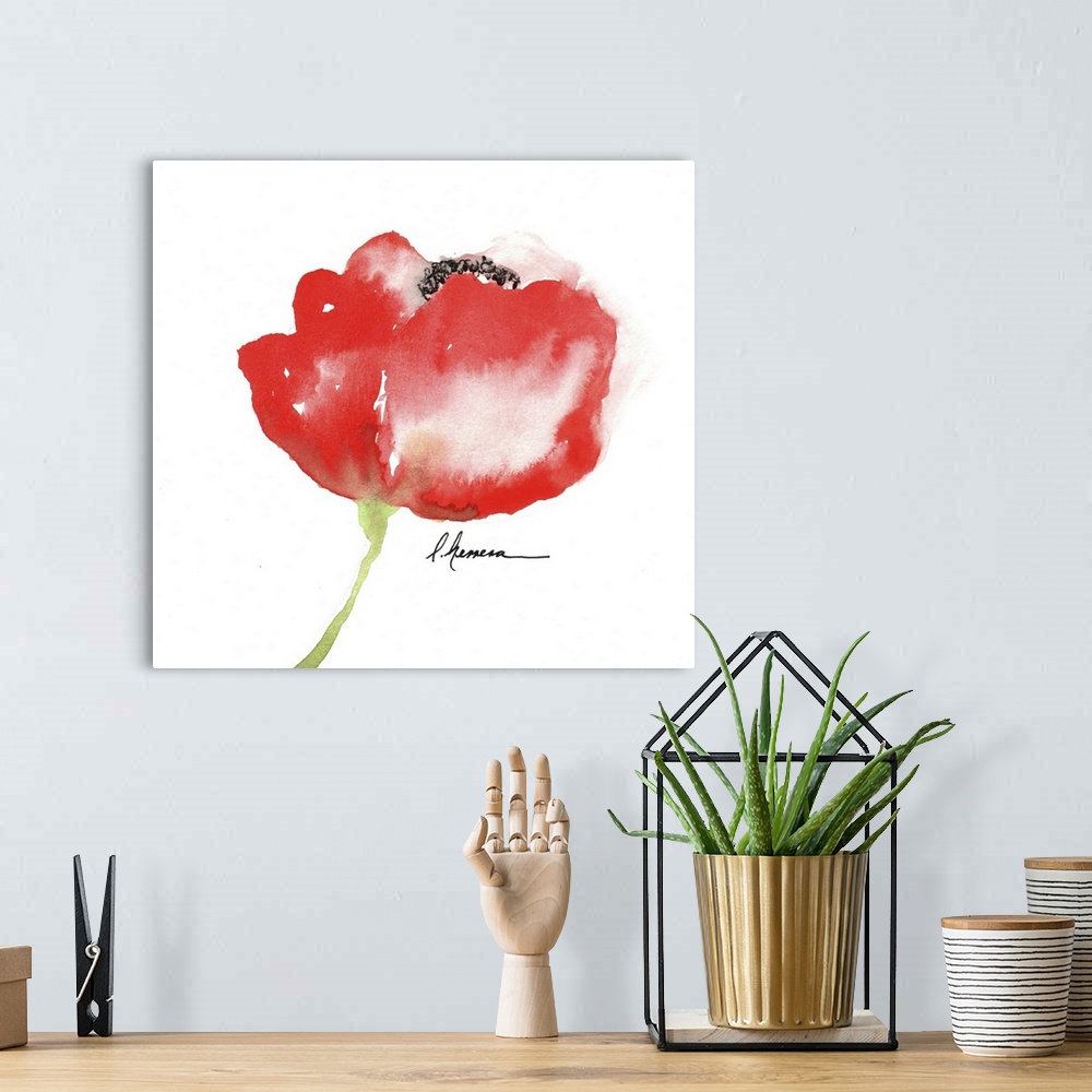A bohemian room featuring Watercolor painting of a red poppy flower.