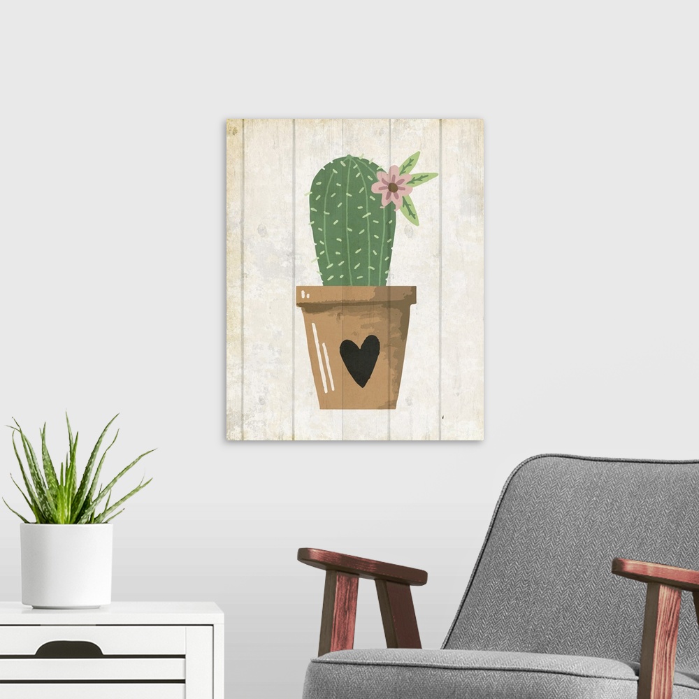 A modern room featuring A painting of a cactus with a flower in a clay pot with a heart painted on it placed on a wooden ...