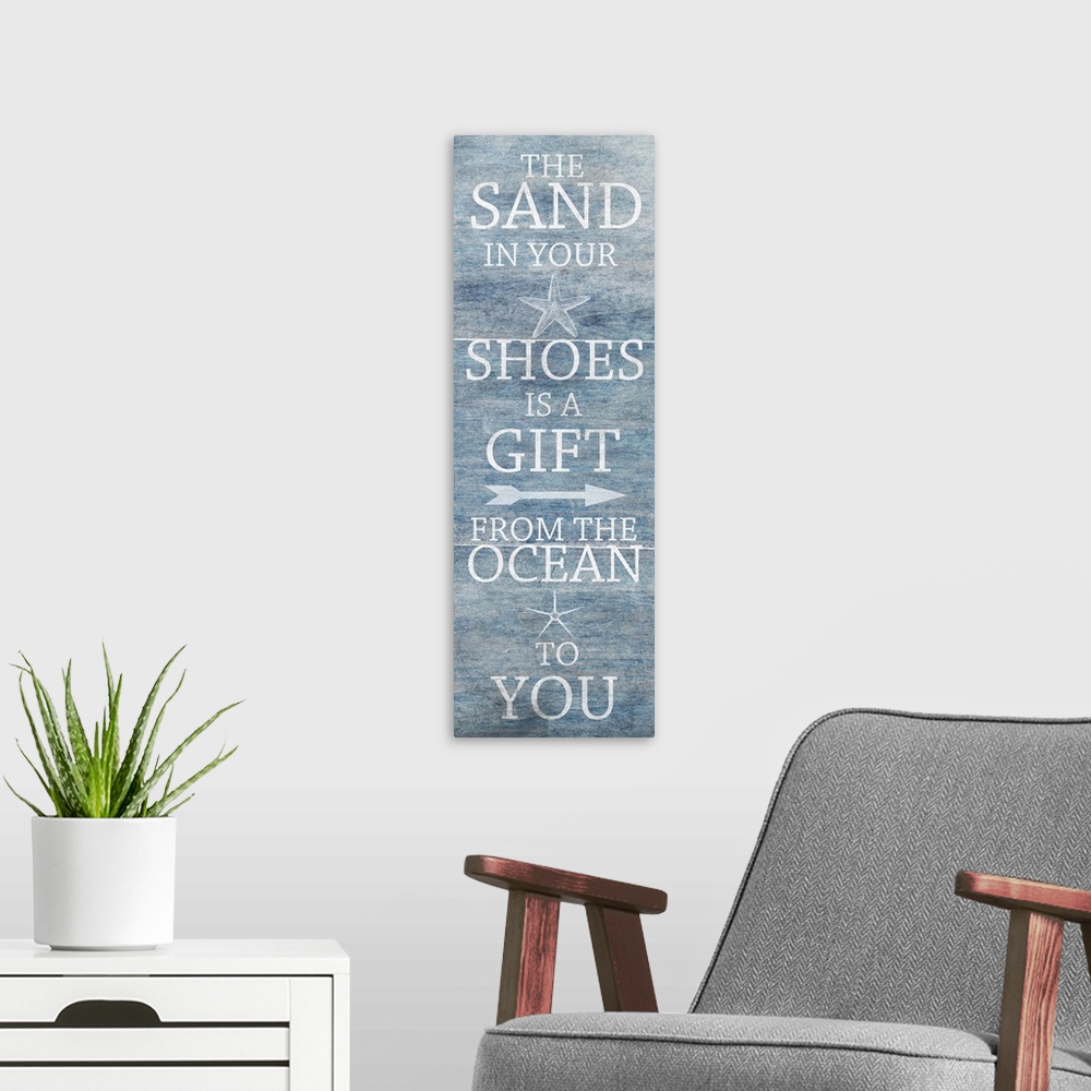 A modern room featuring "The sand in your shoes is a gift from the ocean to you"