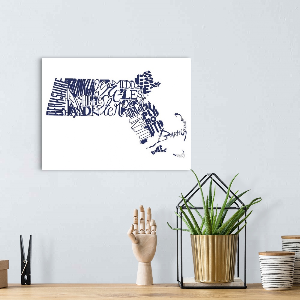 A bohemian room featuring Massachusetts Typography map