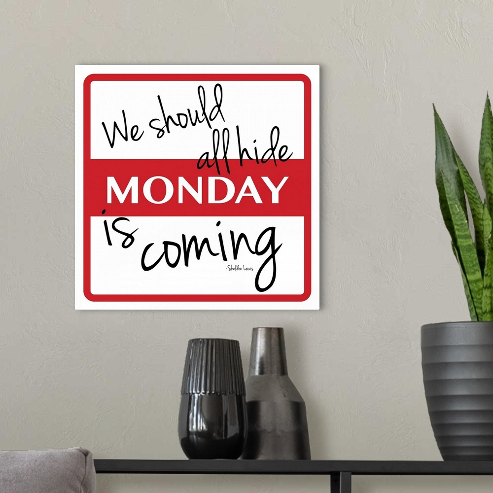 A modern room featuring Typographical artwork of a name tag sticker with the word "Monday" in the middle.